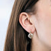 Paire de boucles d'oreilles "Dormeuses" en or jaune et or blanc et diamants