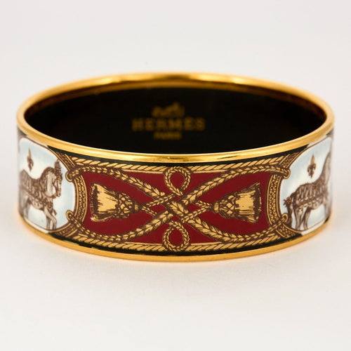 Bracelet HERMÈS - Bracelet en métal doré et émail à  motif hippique 58 Facettes DDV8640-1