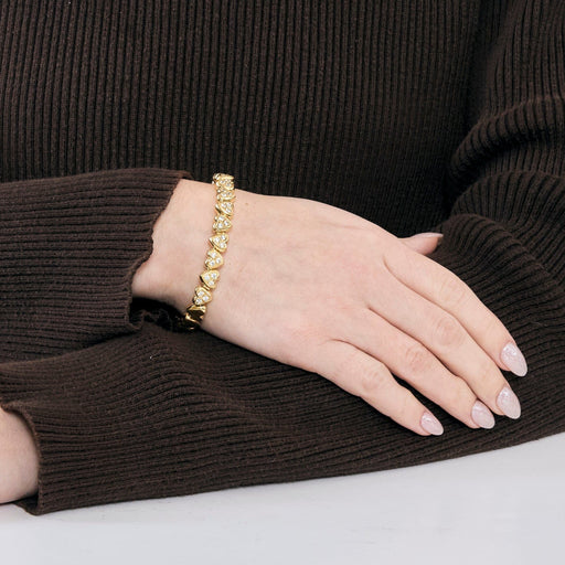 Bracelet Bracelet jonc "Cœurs" en or jaune et pierres blanches 58 Facettes DV0654-3