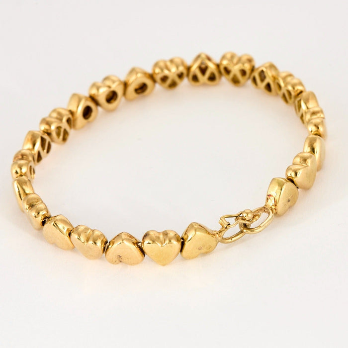 Bracelet Bracelet jonc "Cœurs" en or jaune et diamants 58 Facettes DV0654-3