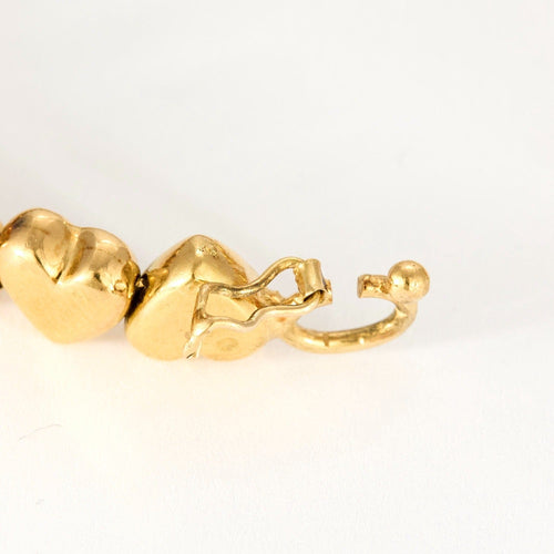 Bracelet Bracelet jonc "Cœurs" en or jaune et pierres blanches 58 Facettes DV0654-3