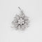 Broche Broche fleur, or blanc et diamants 58 Facettes DV0770-13