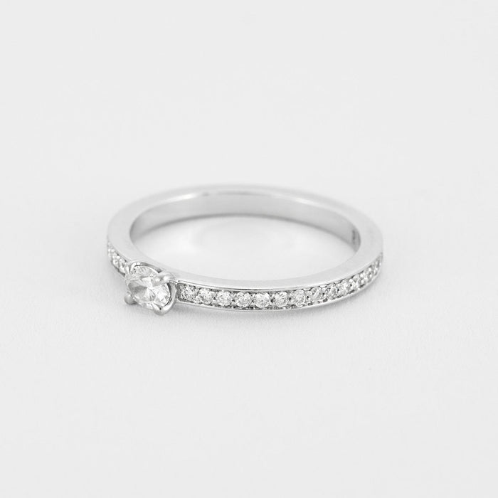 REPOSSI - Bague solitaire en or blanc et diamant ovale