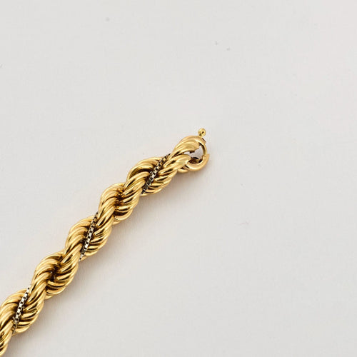 Bracelet Bracelet torsadé en or jaune et diamants 58 Facettes DV10645-1