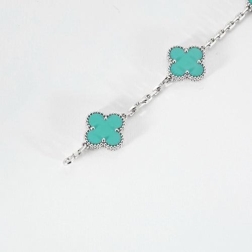 Bracelet VAN CLEEF & ARPELS - Vintage Alhambra - Bracelet or blanc et turquoise 58 Facettes DV0830-14