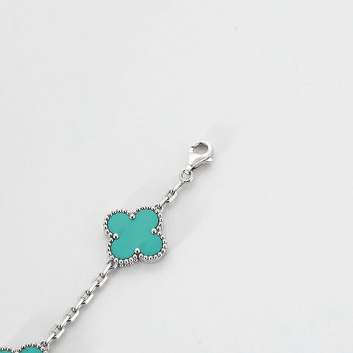 Bracelet VAN CLEEF & ARPELS - Vintage Alhambra - Bracelet or blanc et turquoise 58 Facettes DV0830-14