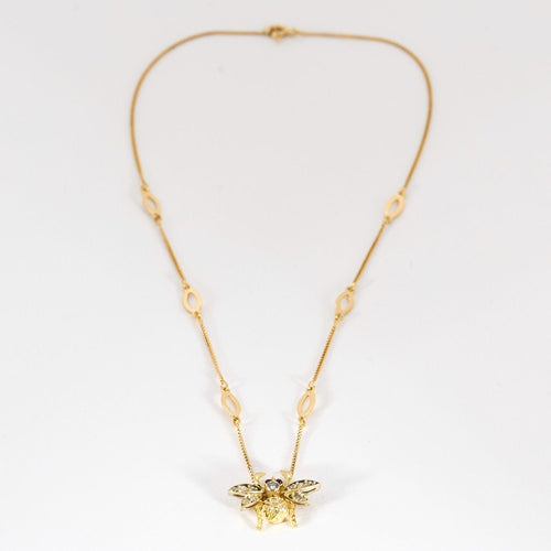 Collier Collier or jaune à motif d'abeille, diamants et rubis 58 Facettes DV10645-17