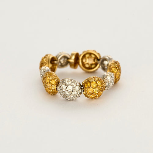 CHANTECLER- Bagues souples en or jaune et or gris, diamants et saphirs jaune