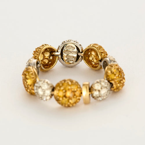 CHANTECLER- Bagues souples en or jaune et or gris, diamants et saphirs jaune