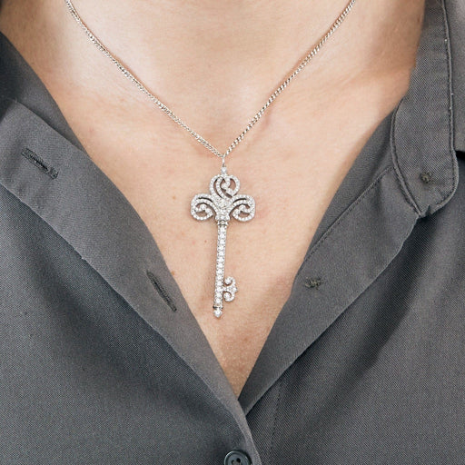 Pendentif TIFFANY - Fleur de lys - Pendentif Clef platine et diamants 58 Facettes DV0707-3