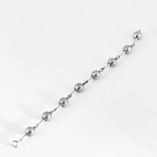 Bracelet HERMES - Bracelet Vintage en Argent Motif balles de golf 58 Facettes DV13878-2