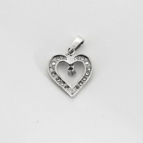 Pendentif Pendentif coeur en or blanc et diamants 58 Facettes DV0013-27