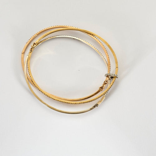 Bracelet Trois bracelets en or de trois couleurs et diamants 58 Facettes DV11154-7