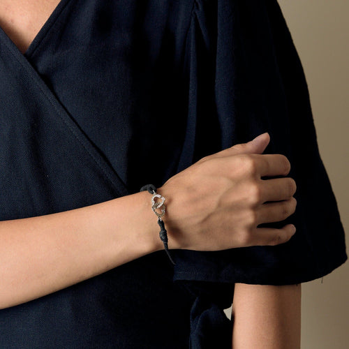 Bracelet DINH VAN - Bracelet en cordon noir, or blanc et diamants 58 Facettes DV16977-3