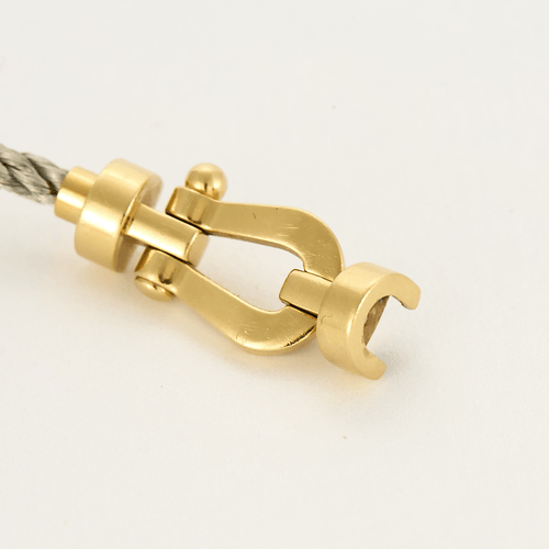 Bracelet FRED - Force 10 - Bracelet en or jaune et cordon en acier 58 Facettes DV17381-7