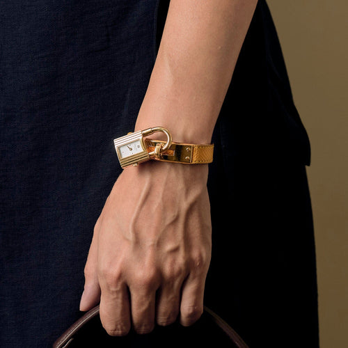 Montre HERMES - Kelly - Montre cadenas métal doré à mouvement quartz 58 Facettes DV17875-1
