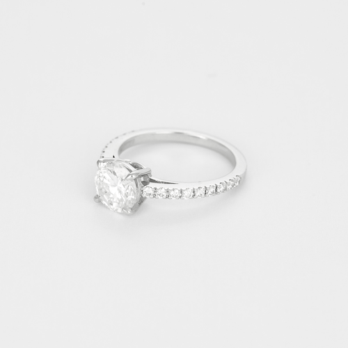Bague solitaire en or gris et diamants
