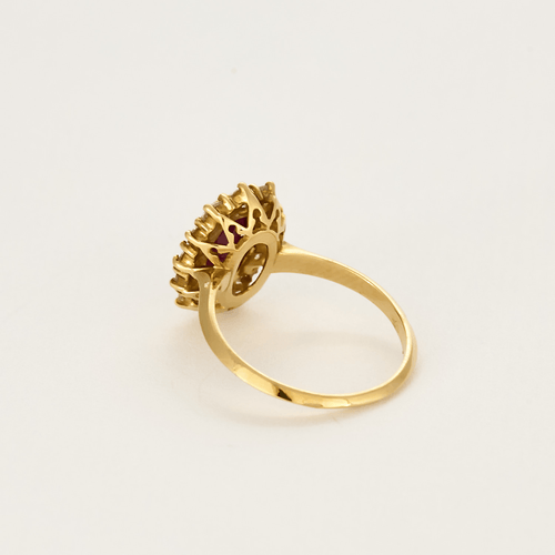 Bague marguerite en or jaune , rubis et diamants