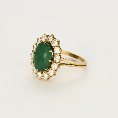 Importante Bague marguerite en or jaune émeraude et diamants