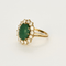 Importante Bague marguerite en or jaune émeraude et diamants