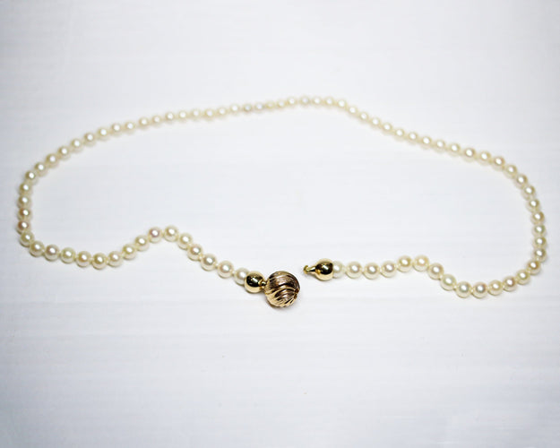 Collier Collier de perles de culture en or jaune 750 et fermoir boule 58 Facettes A11330 A11112