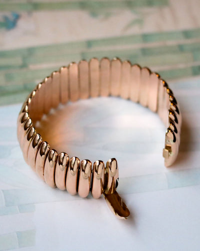 Bracelet Manchette semi-rigide maillons ovales allongés en or rose 750 58 Facettes A11292