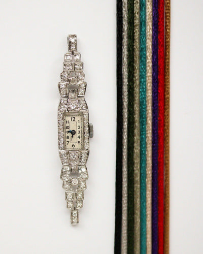 Montre Montre Art Déco en platine pavée de diamants 58 Facettes A11302