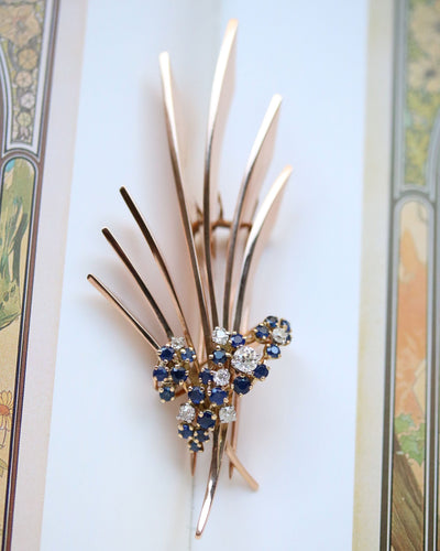 Broche Broche motif feuilles 1950 en or rose, saphirs et diamants 58 Facettes A11347