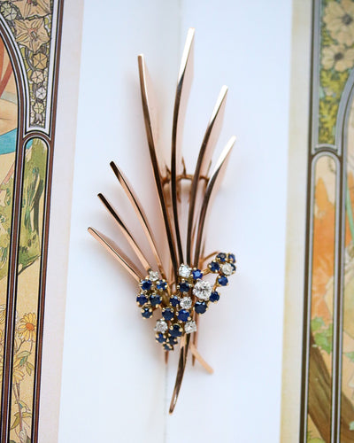 Broche Broche motif feuilles 1950 en or rose, saphirs et diamants 58 Facettes A11347