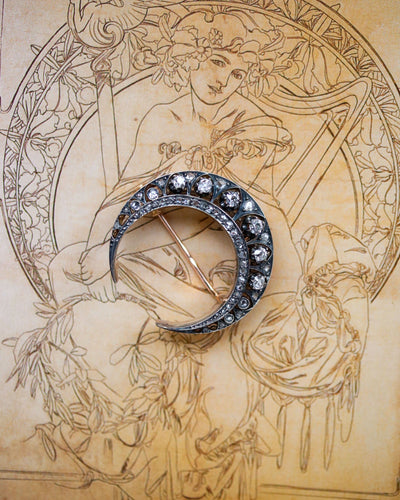 Broche Broche croissant de lune en or rose et argent, diamants 58 Facettes A11386