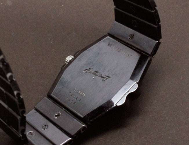 Montre Chopard - Montre St. Moritz noire en acier rhodié noir 58 Facettes A1155