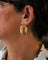 Boucles d'oreilles Boucles d’oreilles créoles motif torsadé en or jaune 750 58 Facettes A11887