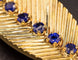 Broche Van Cleef & Arpels - Broche feuille en or jaune et saphirs, diamants 58 Facettes A9417