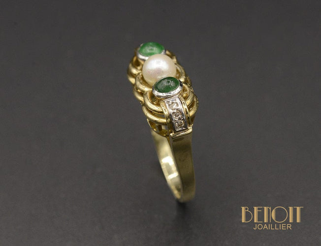 Bague 56.5 Bague jarretière en or jaune et or blanc, perle de culture, émeraudes 58 Facettes A9703