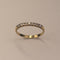 Bague 52 Alliance demi-tour en or jaune 18 carats et diamants 0,18 ct 58 Facettes 250245