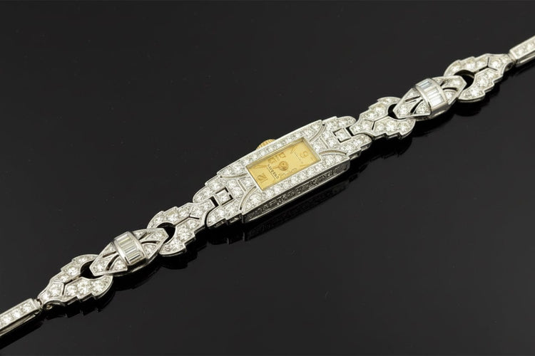 Montre Montre Art déco en or blanc 18 carats et diamants 58 Facettes