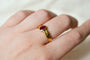 Bague 56 Bague décor tressé en or jaune 18 carats et rubis 58 Facettes Ref3467