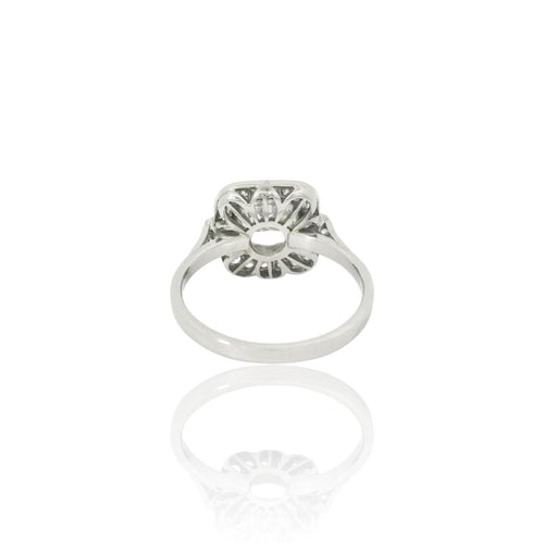 Bague 53 Bague coussin en platine et diamants (centre 1,54 ct) 58 Facettes