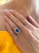 Bague 50 Bague Pompadour saphir cabochon et diamants en or gris 18 carats 58 Facettes BSA65
