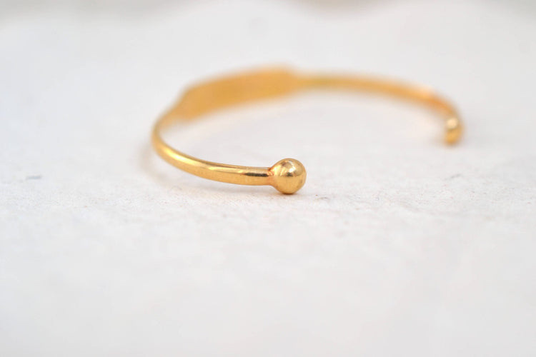 Bracelet Bracelet jonc bébé en or jaune 18 carats 58 Facettes 3329