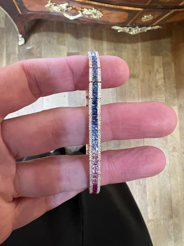 Bracelet Bracelet tennis en or rose 18 carats saphirs arc-en-ciel et diamants 58 Facettes BRA92
