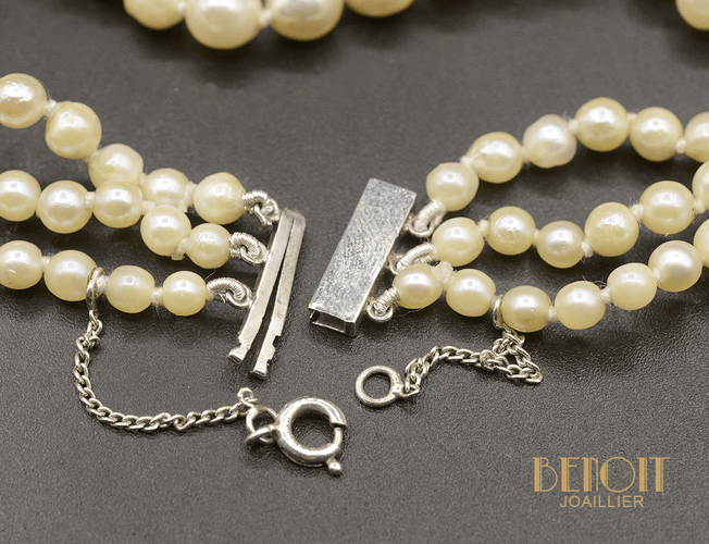 Bracelet Bracelet 3 rangs de perles de culture en or blanc 58 Facettes C1910