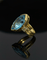 Bague 53 Bague - Topaze bleue taille marquise et diamants en or jaune 18 carats 58 Facettes