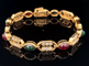 Bracelet OJ Perrin bracelet in 18k yellow gold, diamonds, cabochon emeralds and rubies 58 Facettes 58F19