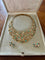 Boucles d'oreilles Gilbert Albert - Demi-parure collier plastron et clips d’oreilles en or jaune 58 Facettes BS153