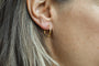 Boucles d'oreilles Boucles d’oreilles créoles gravées en or jaune 18 carats 58 Facettes 3651