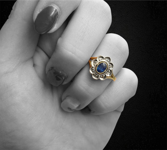 Bague Bague marguerite années 1930 en or jaune, saphir et diamants 58 Facettes