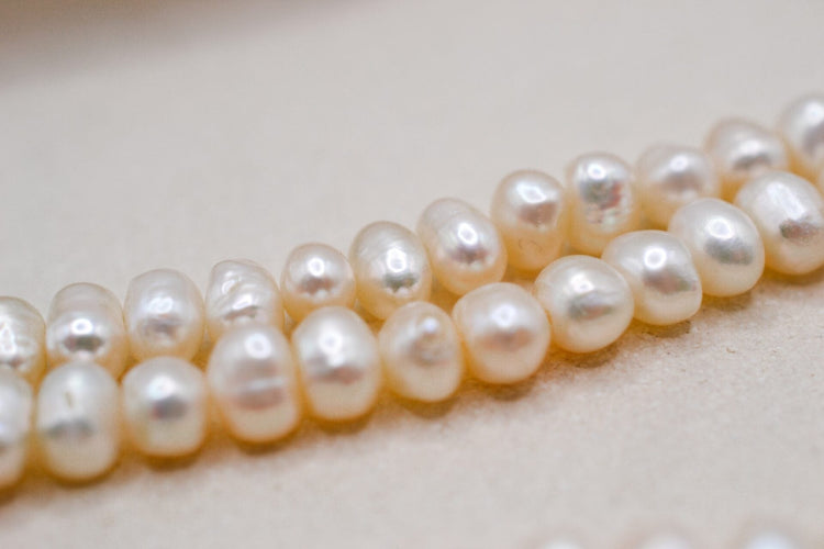 Collier Collier de perles de culture oblongues en or jaune 18 carats 58 Facettes 3791