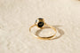Bague 52 Bague sertie griffes en or jaune 18 carats et hématite 58 Facettes 3611