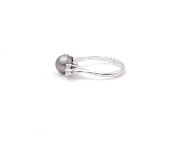 Bague Bague en or blanc 18 kt avec perle de Tahiti et diamants 58 Facettes 14607